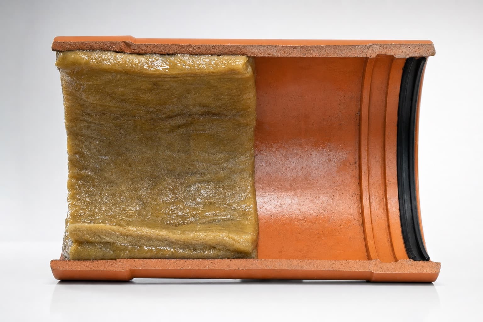 The same pipe section with a wet resin-saturated felt liner part way through it